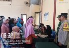 Sinergitas TNI-Polri, Bhabinkamtibmas dan Babinsa Desa Kondangsari Dampingi Pembagian Bantuan Langsung Tunai Kesra