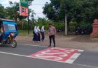 Anggota Piket Polsek Waled Laksanakan Giat Pengaturan PH Pagi, Wujudkan Kelancaran Arus Lalu Lintas dan Keamanan Pengguna Jalan