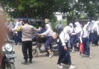 POLSEK PANGURAGAN LAKSANAKAN GIAT PENGATURAN LALU LINTAS DI SEJUMLAH TITIK RAWAN KEMACETAN