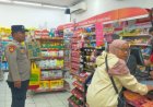 Aiptu Rajimin Kanit Samapta dan Bripka Jaenal sambangi Minimarket Alfamart di Desa Kalimukti dan Cek CCTV.